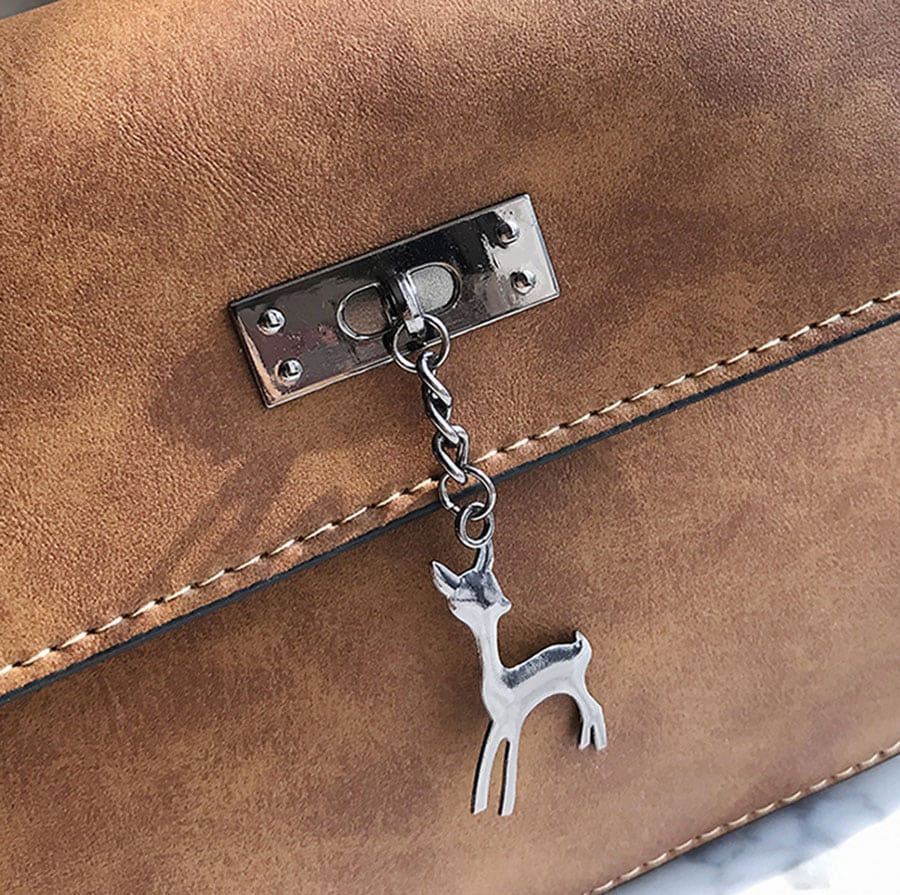 Elegant Crossbody Bag with Deer Pendant