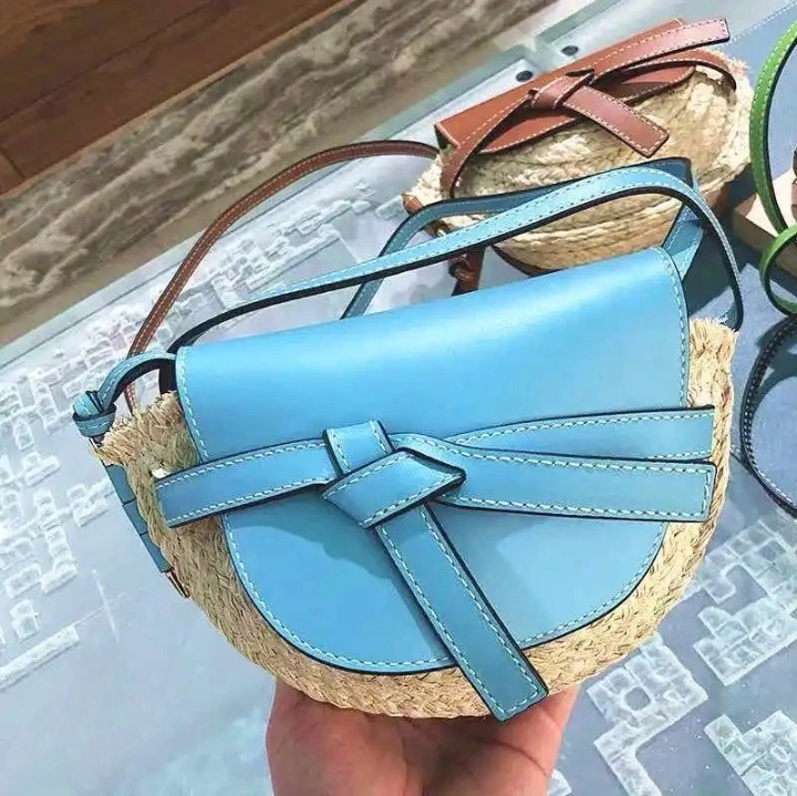 Fira half-moon Straw Saddle Bag