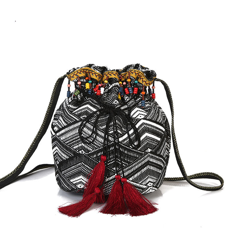 Beautiful Boho Style Crsossbody Bag with Tassel Decorations