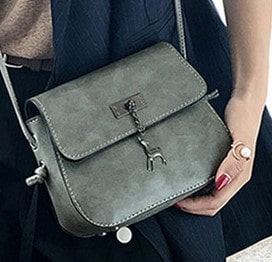Elegant Crossbody Bag with Deer Pendant