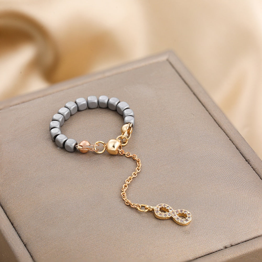 Kamala Hematite Rings with Chain Pendant Charm