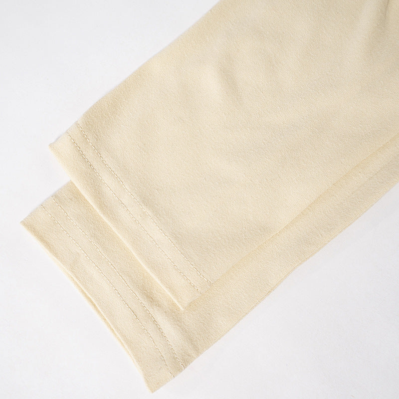 Rin Pierced Turtleneck Knit Tops