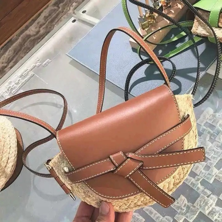 Fira half-moon Straw Saddle Bag