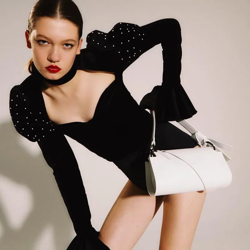 Saira Rolled Look Baguette Bag