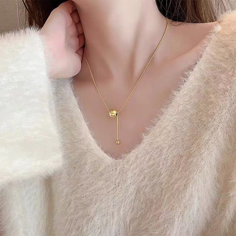 Wella Linked Gold Spheres Necklace