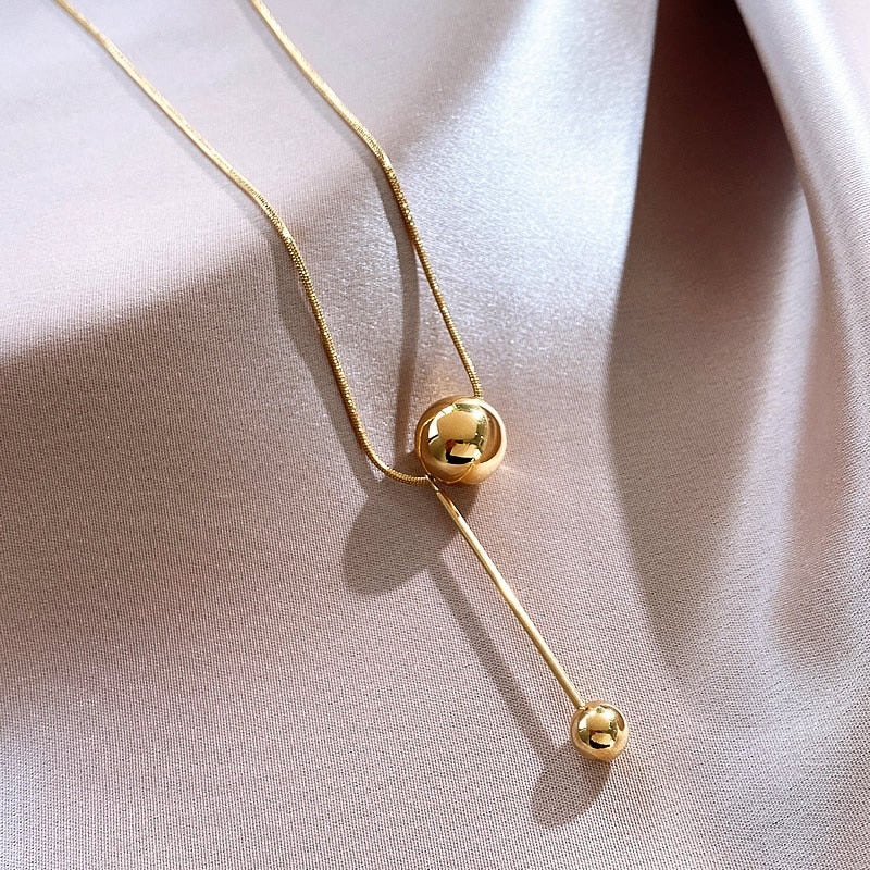 Wella Linked Gold Spheres Necklace