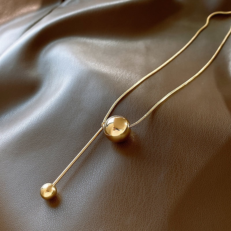 Wella Linked Gold Spheres Necklace